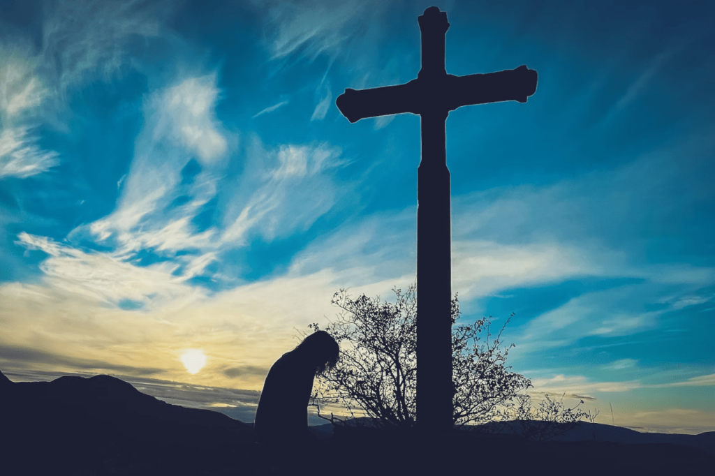 tomar a sua cruz é entregar-se ao sacrifício de Jesus com fé e humildade